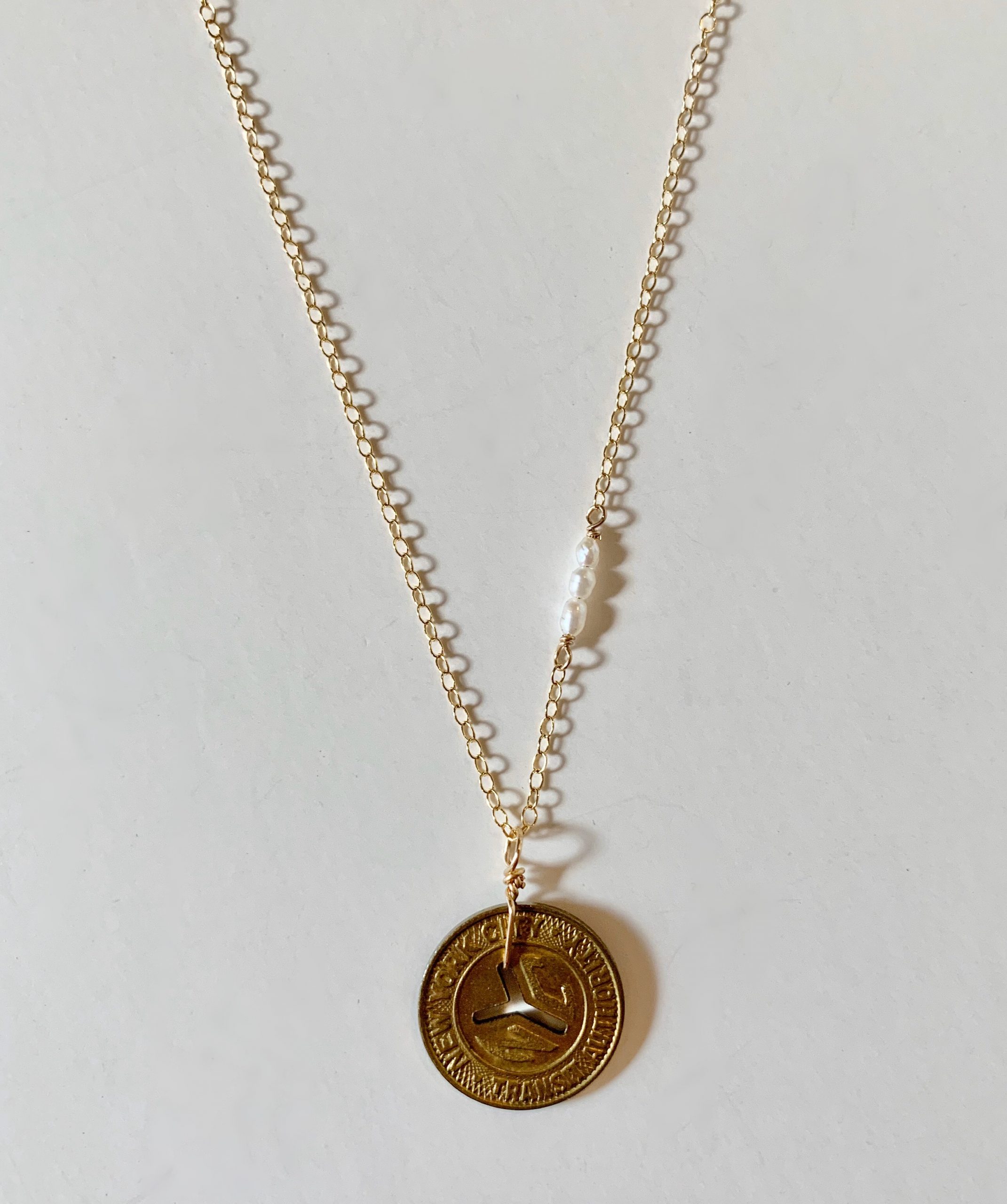 Vintage NYC Subway Token Necklace – The Scarlet Poppy